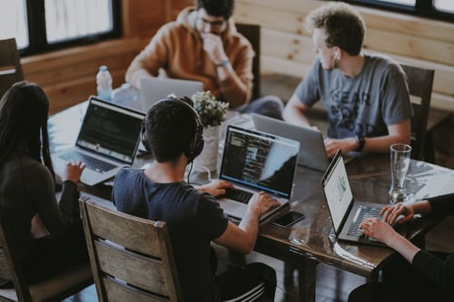 working hubspot agency group at a table