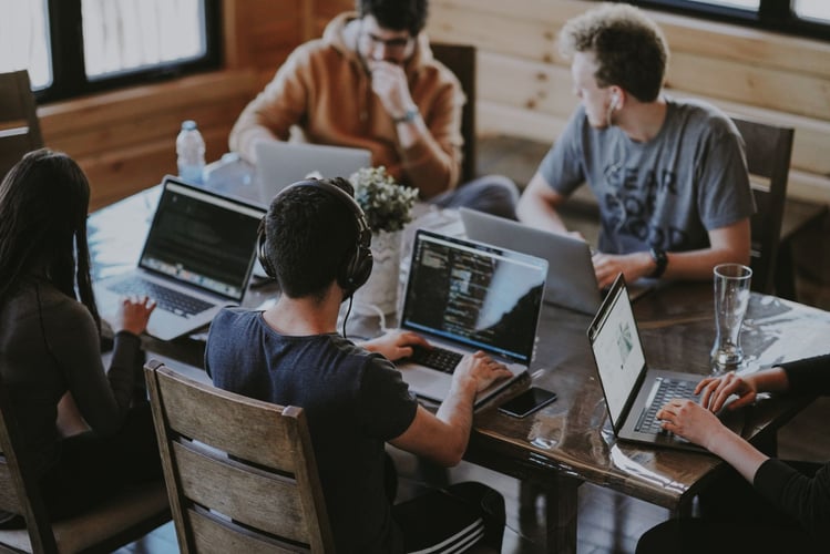 working hubspot agency group at a table